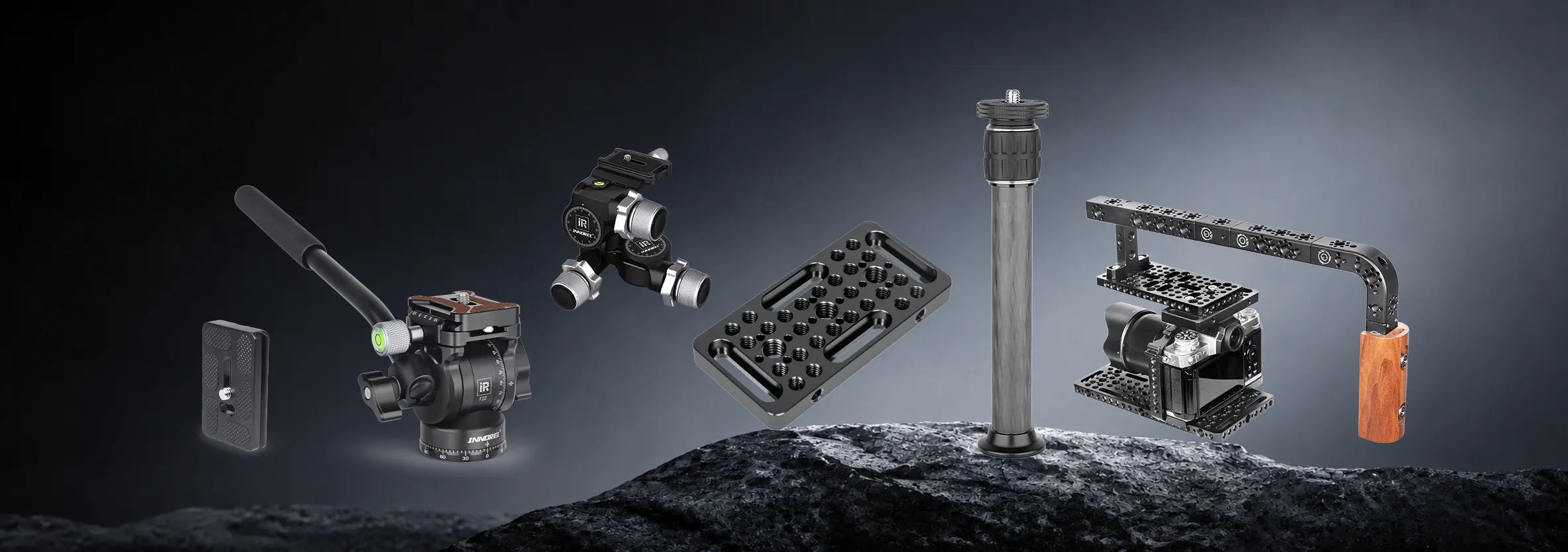 Five essential tripod accessories—quick-release plate, cheese plate, short center column, tripod head, and cheese handle
