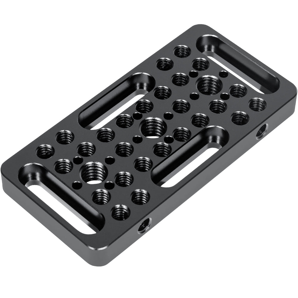 A black anodized aluminum camera mounting plate with multiple threaded holes and two long slot cuts, shown on a plain white background.